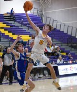 Lemoore's Kaden Lopez scores against Immanuel. 